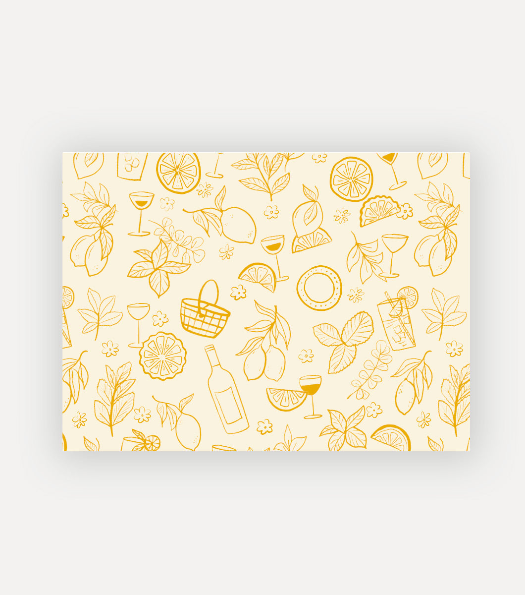 boxed note cards that feature a dark yellow design of picnic items on light yellow background. line drawings of sliced citrus, wine, picnic baskets, plates and fresh herbs