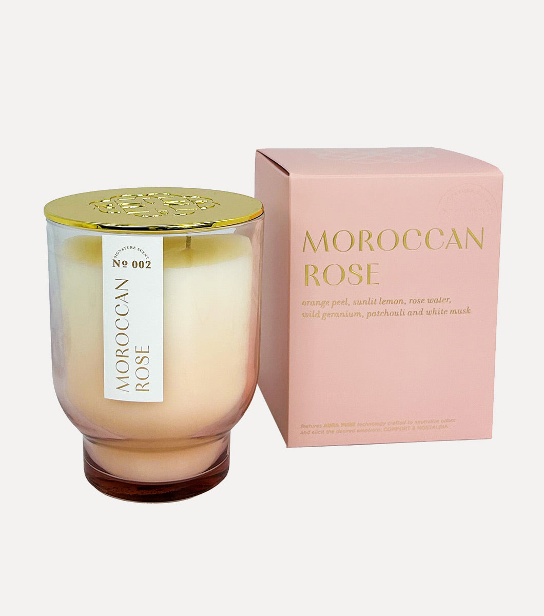 large pink moroccan rose scented candle pictured with included pink gift box