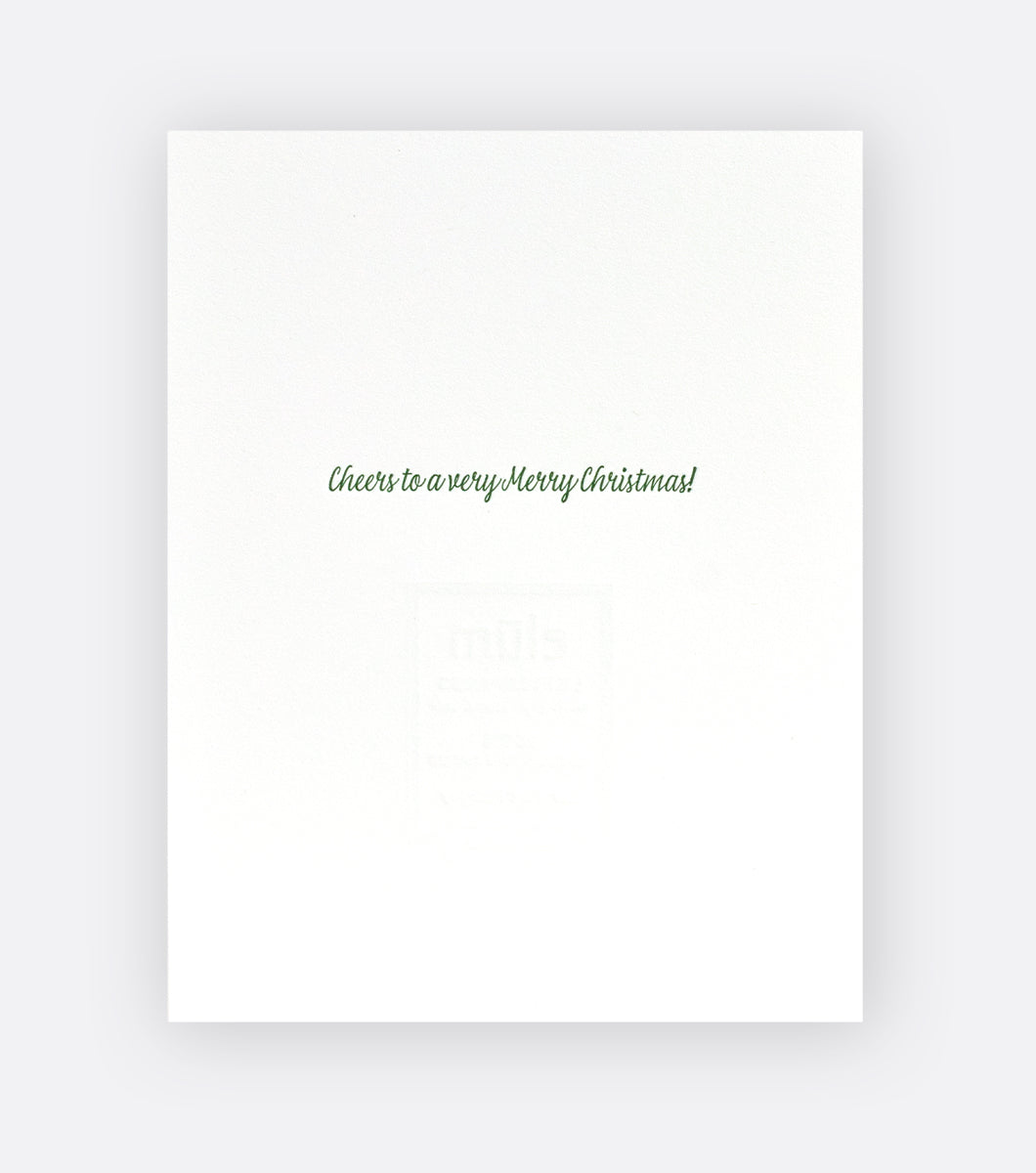 Inside of a holiday greeting card that says "cheers to a very merry christmas"