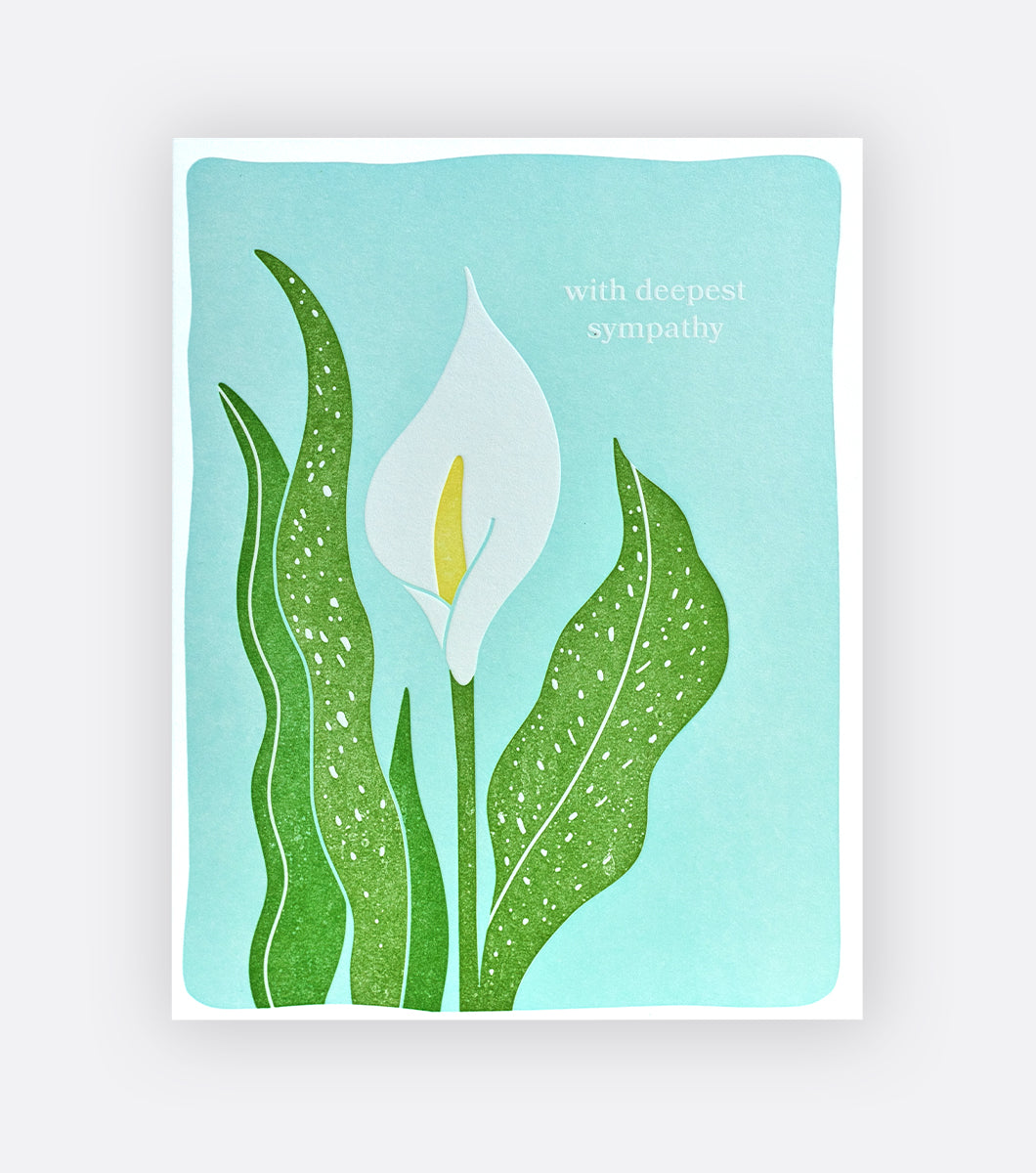 sympathy greeting card with a peaceful calla lily design and a message that says "with deepest sympathy"