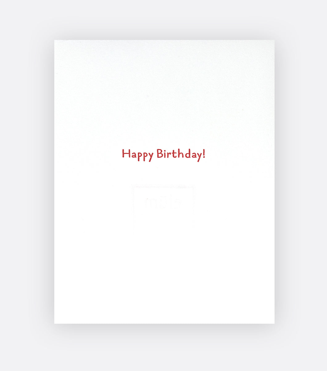 Inside of birthday greeting card that says "happy birthday!"
