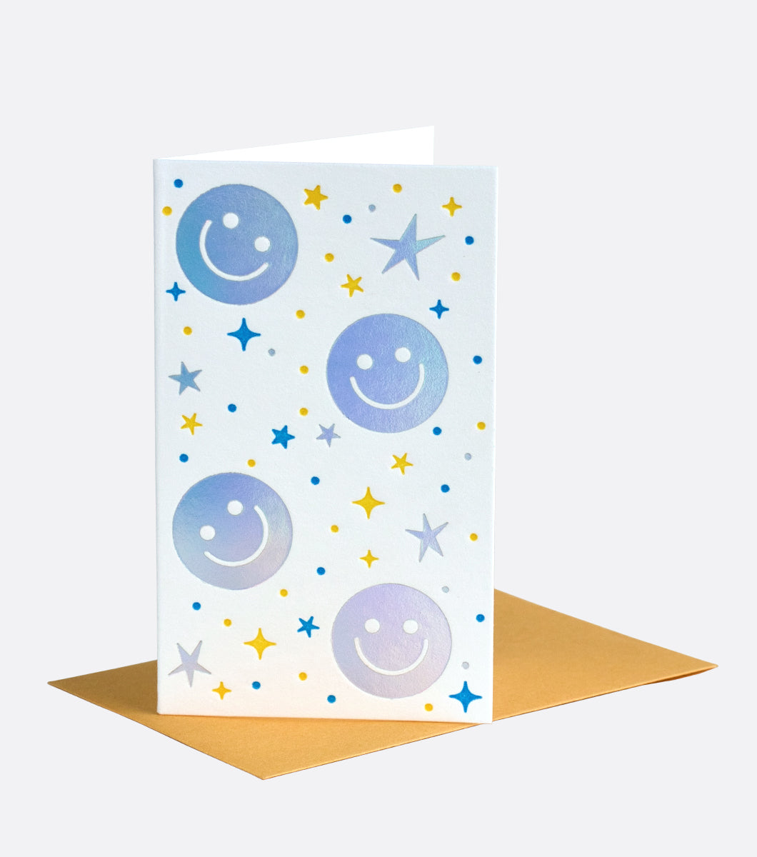 mini note gift enclosure featuring holographic smiley faces and stars