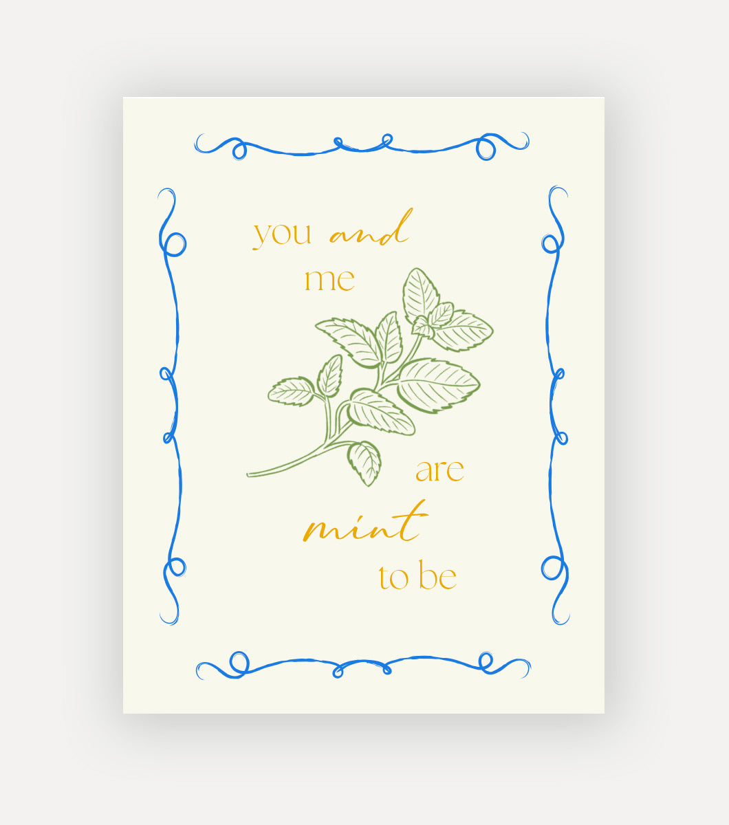 greeting card with a line drawing of a mint sprig with a sentiment that reads "you and me are mint to be" the card has a blue swirly border