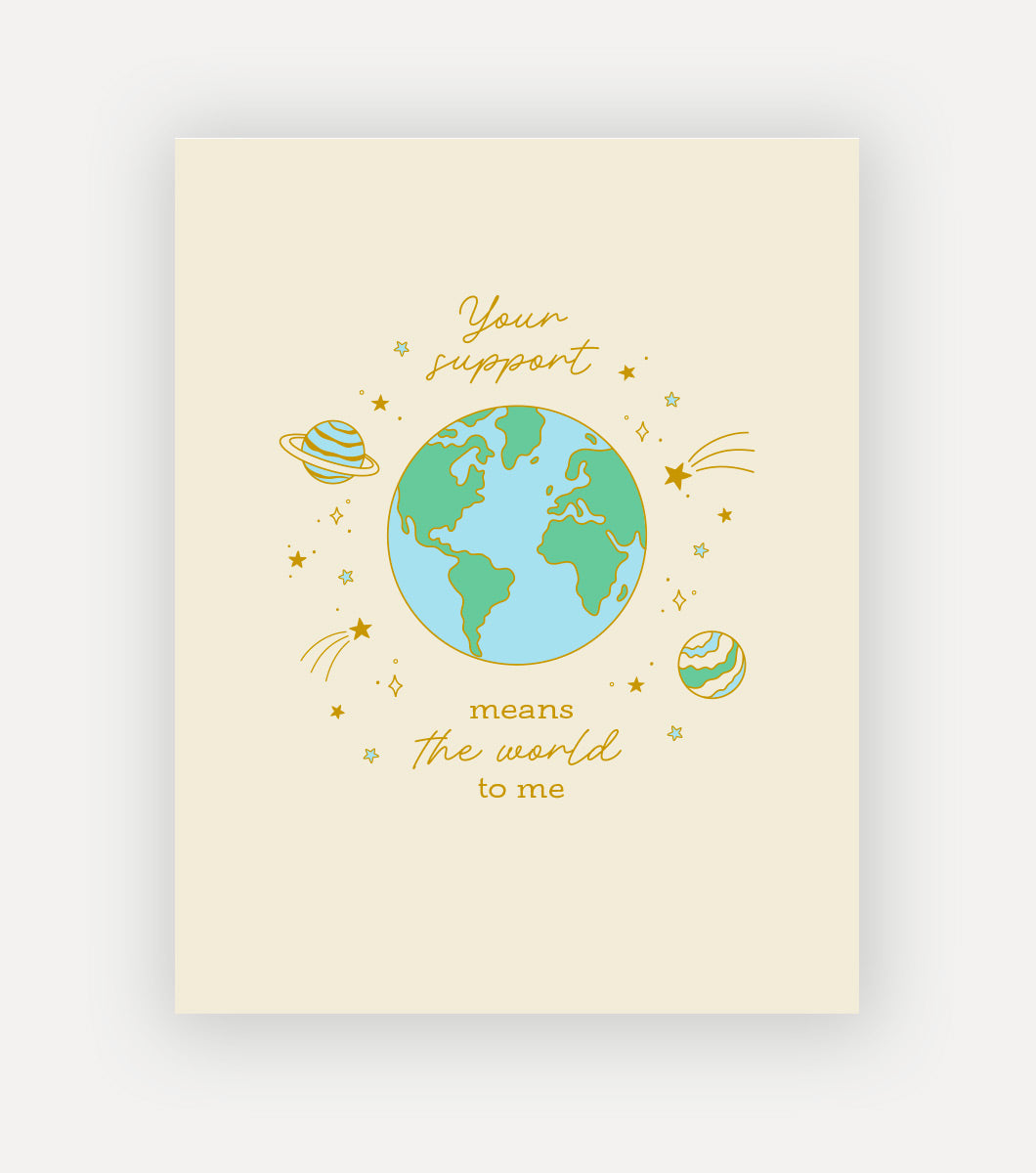 thank you greeting card with design of the earth with planets and stars around it in gold foil. inscription says "your support means the world to me" 