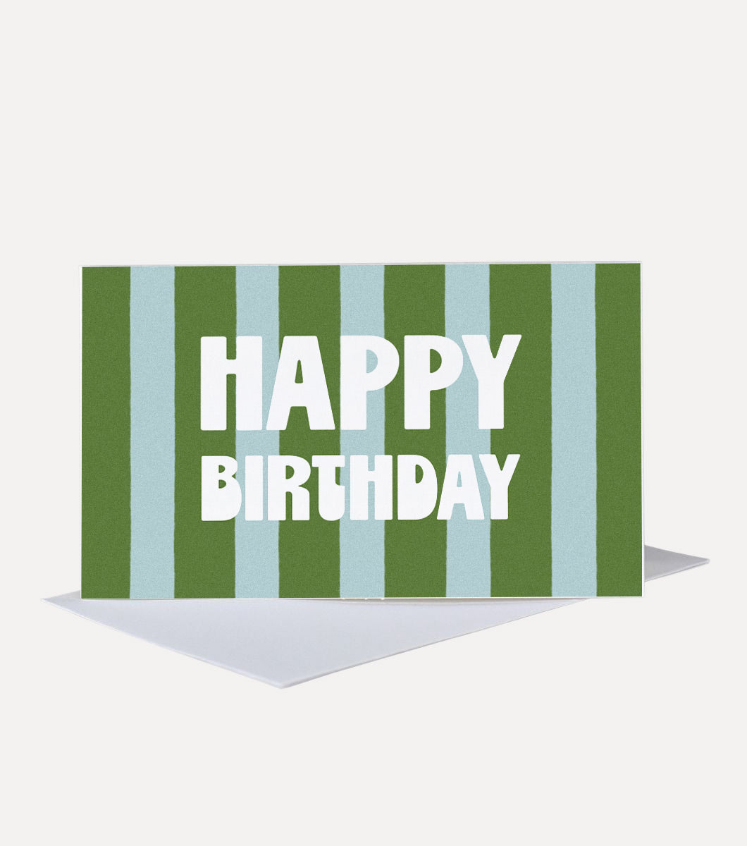 mini greeting card with bold green and blue striped design and a message that says "happy birthday" reversed out in white