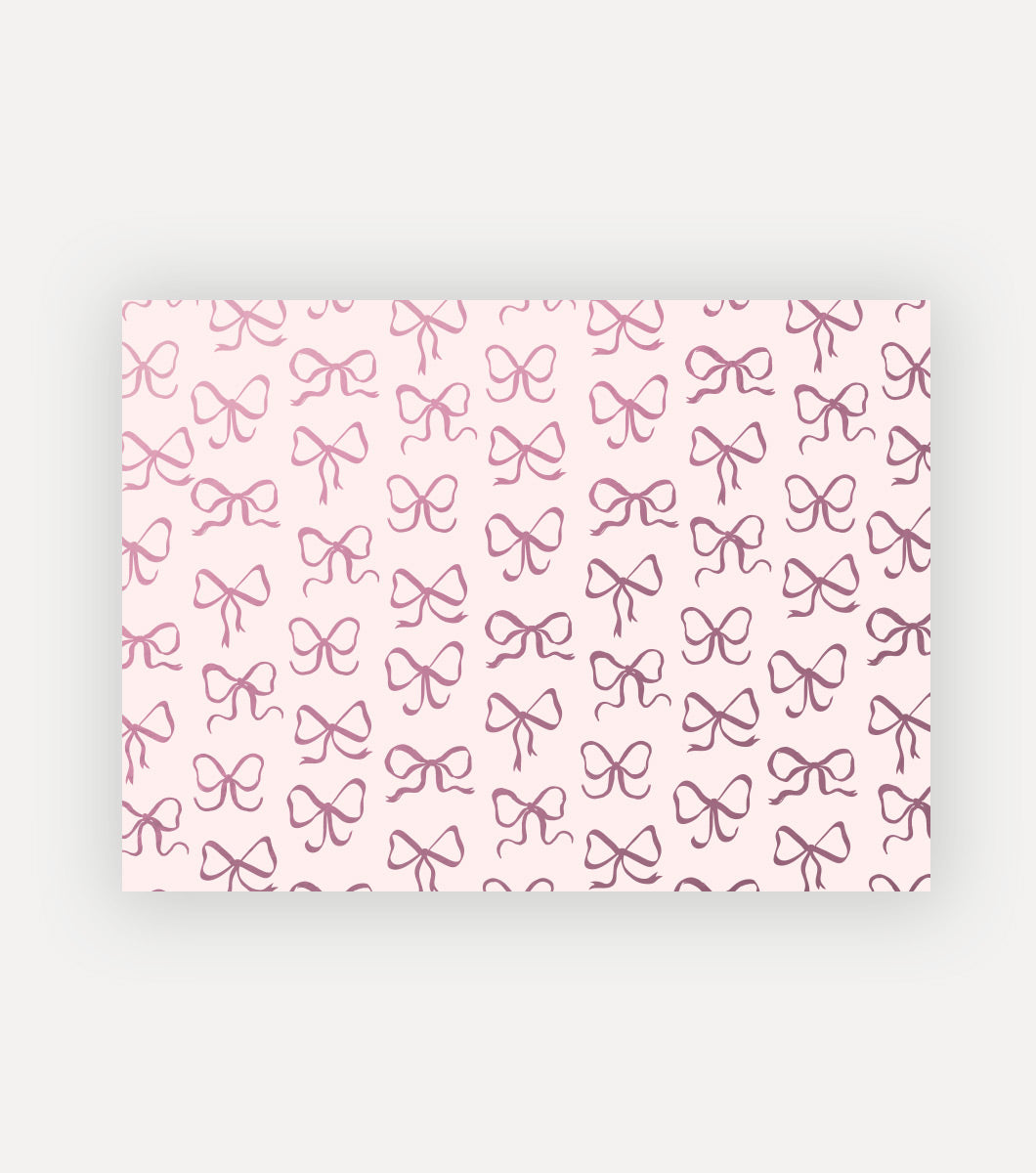 mini boxed notes with light pink background and design of dainty repeating bows in pink pearlescent foil