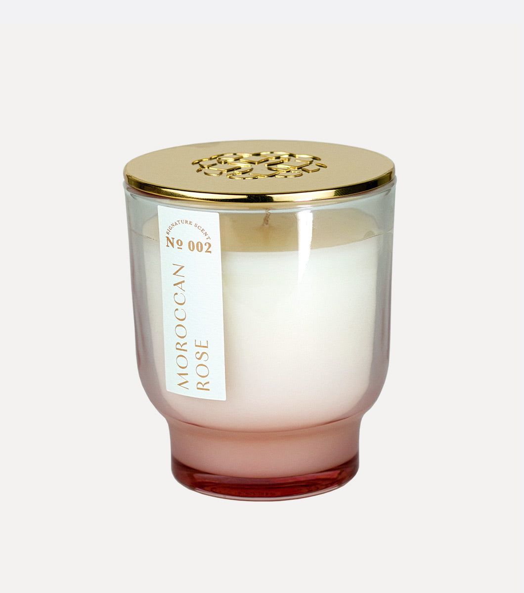 small pink moroccan rose scented hand poured soy wax candle with gold lid