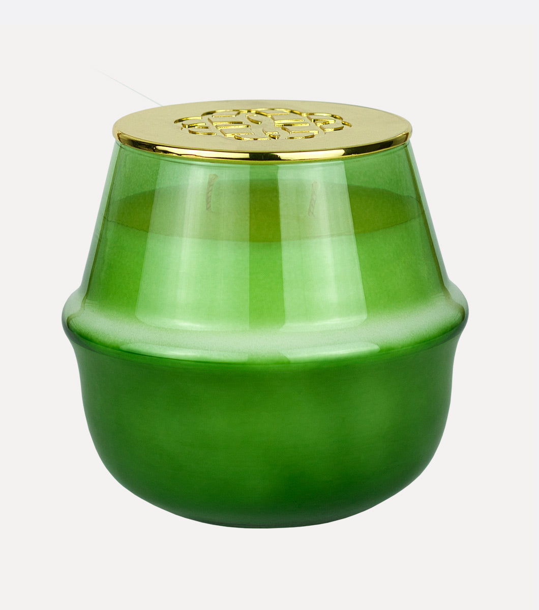 large round green italian bergamot scented hand poured soy wax candle with embossed gold lid