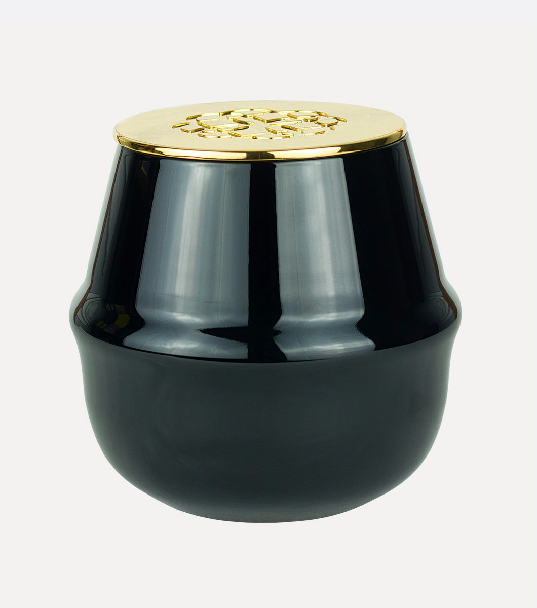 large ribbed black sandalwood scented hand poured soy wax candle with embossed gold lid