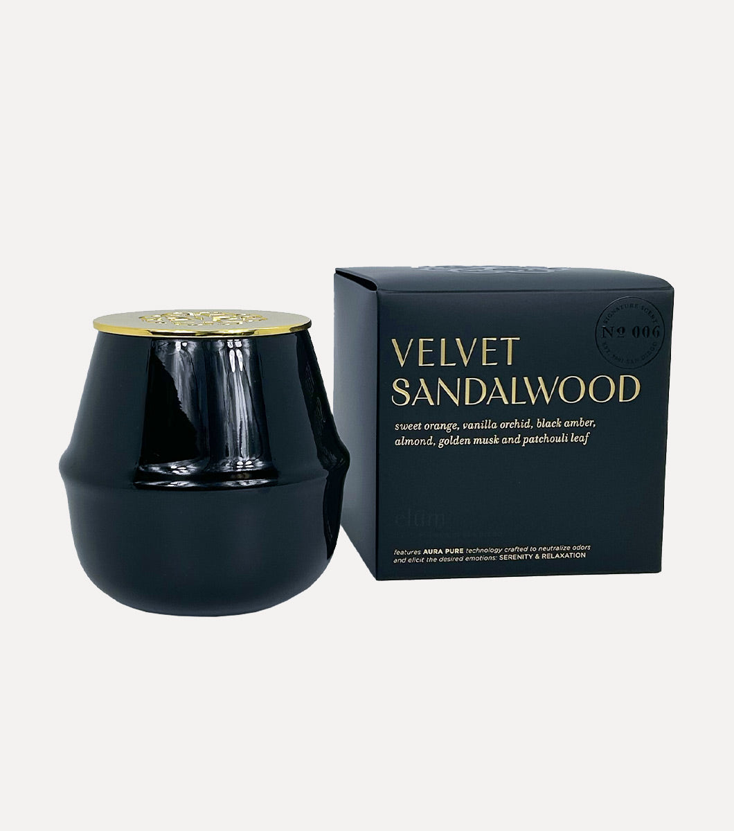 round black velvet sandalwood scented candle pictured next to included black gift box