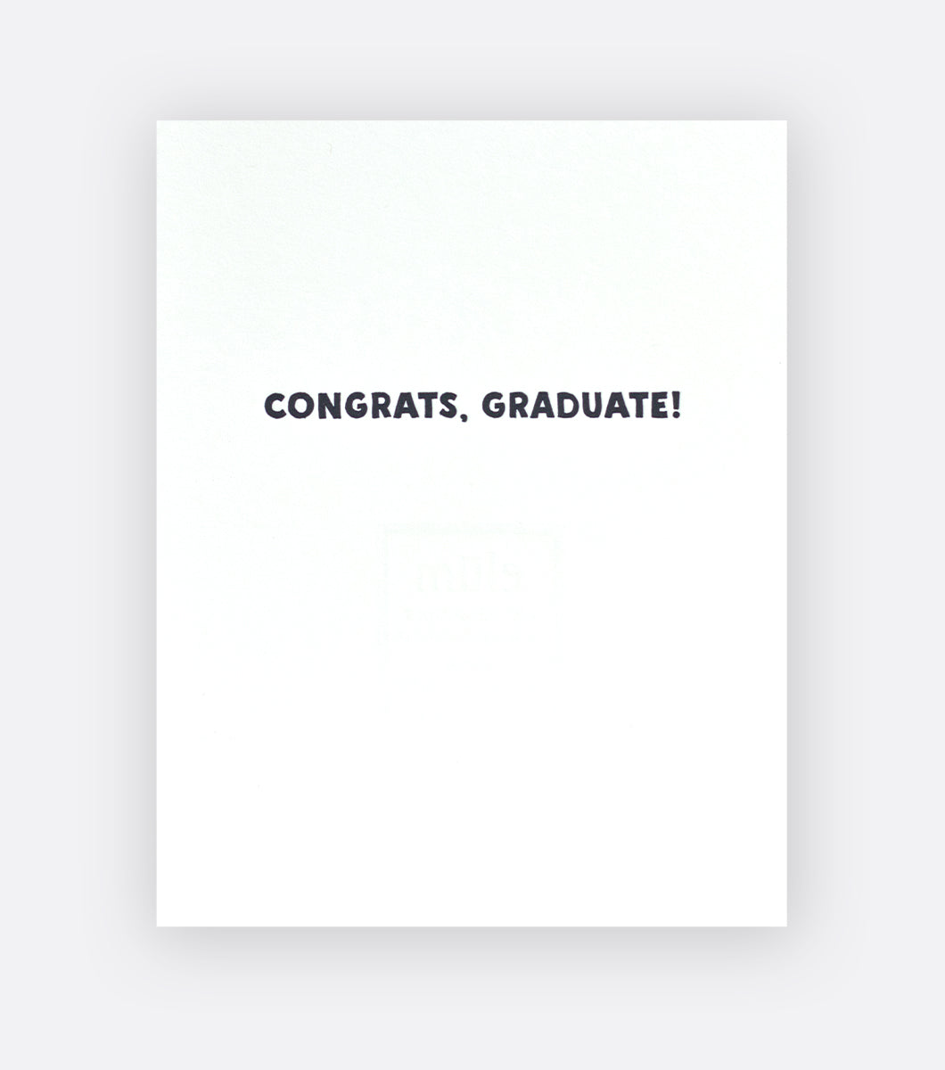 Inside of graduation greeting card that says "congrats, graduate!"