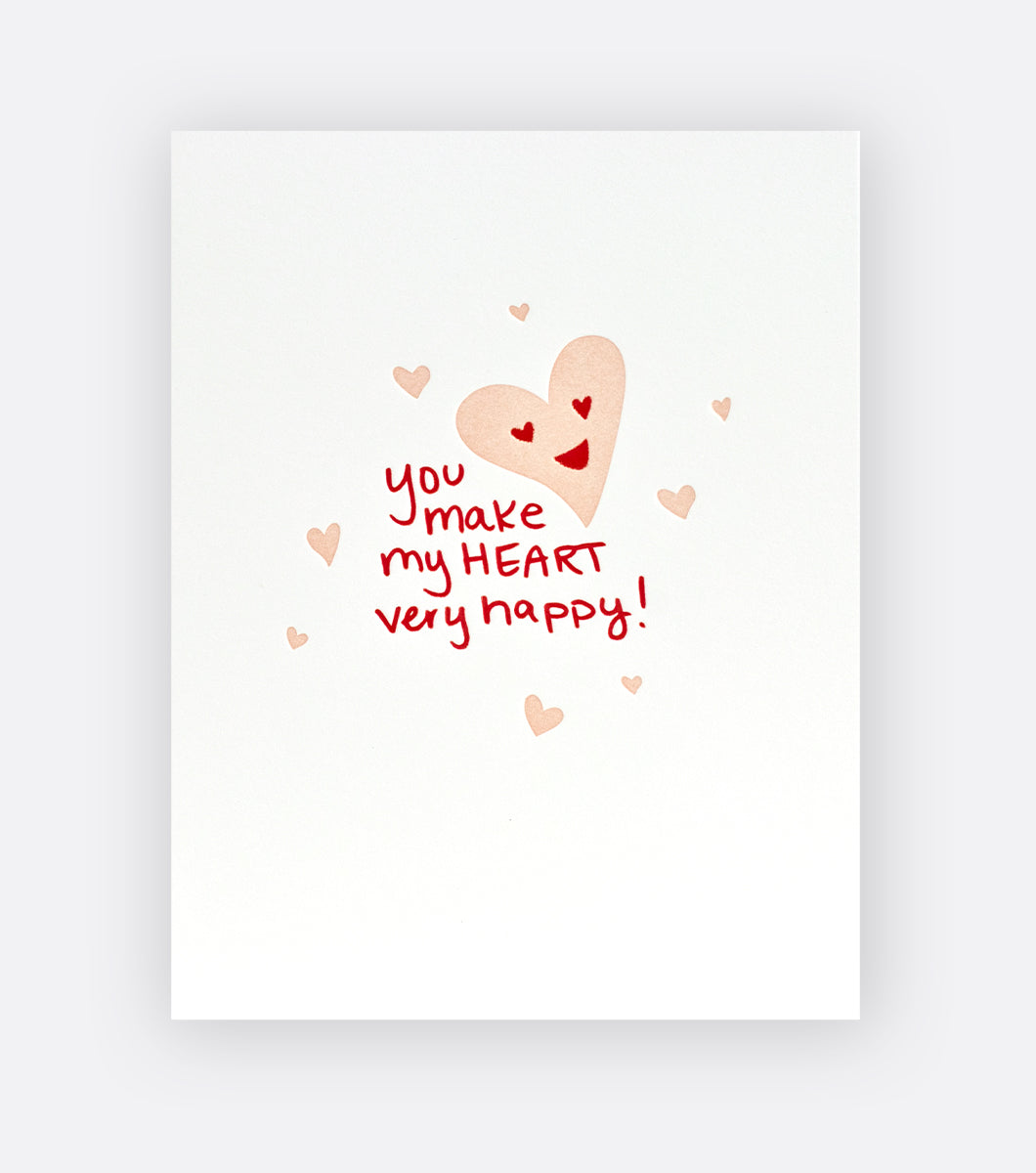 greeting card with happy face heart design that says "you make my heart very happy!" this card is a great valentine's day card or an anniversary card