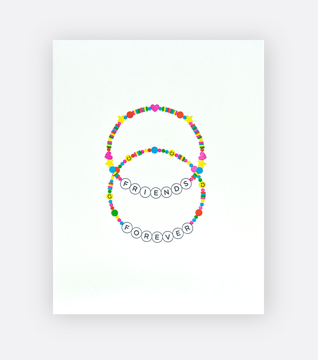 greeting card with two beaded friendship bracelets that say "friends forever" spelled out in the beads