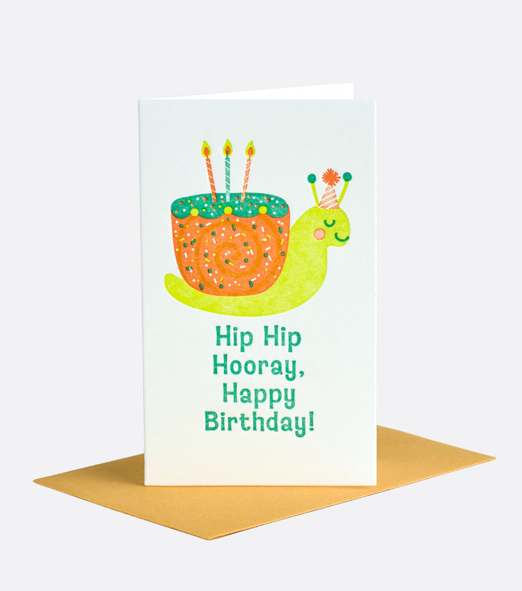 mini note gift enclosure with envelope that features snail with party hat and snail shell birthday cake with candles and a sentiment that reads "hip hip hooray, happy birthday!"