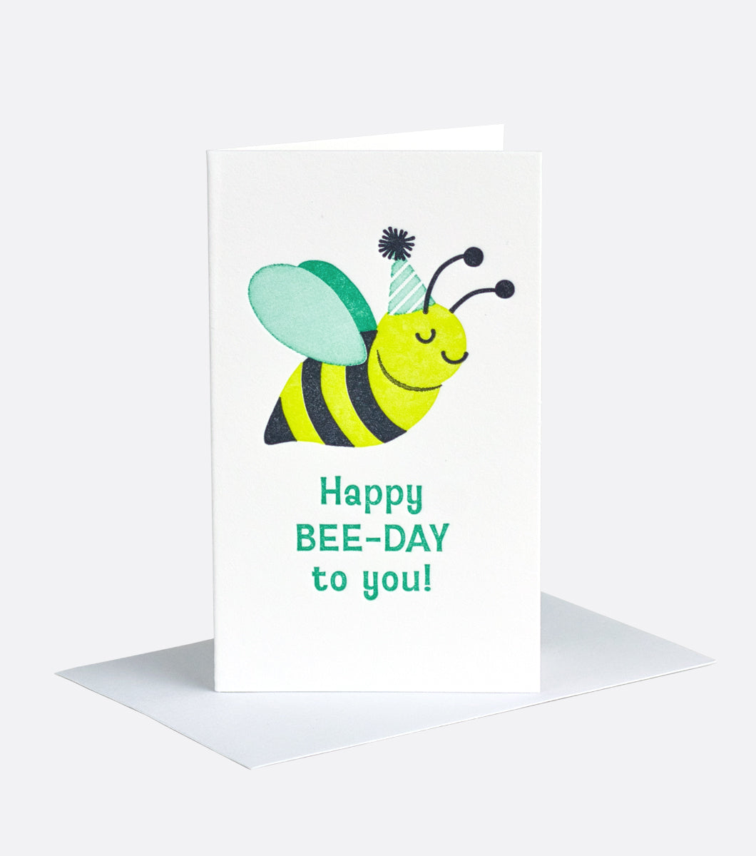 Mini note gift enclosure with bumble bee wearing a party hat with a sentiment that reads "happy Bee-day to you!" 