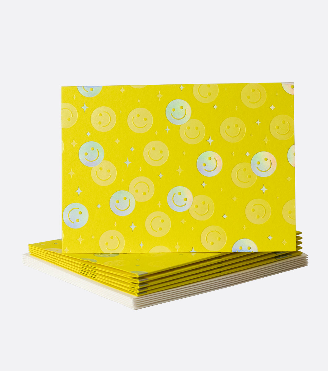 smiley face boxed note thank you greeting card on bright yellow paper featuring happy face design in holographic foil 